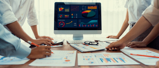 Aufkleber - Panorama shot analyst team utilizing BI Fintech to analyze financial report with laptop. Businesspeople analyzing BI power dashboard displayed on laptop screen for business insight. Scrutinize