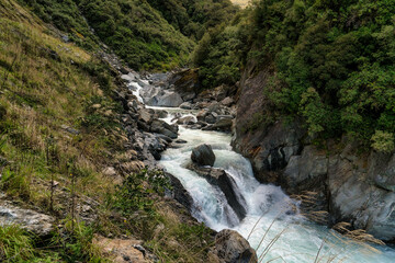 Wall Mural - The powerful Haast river flowing the Haast Gates through the mountain Pass