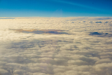 Wall Mural - Morning sunrise sky with cloud above view from airplane