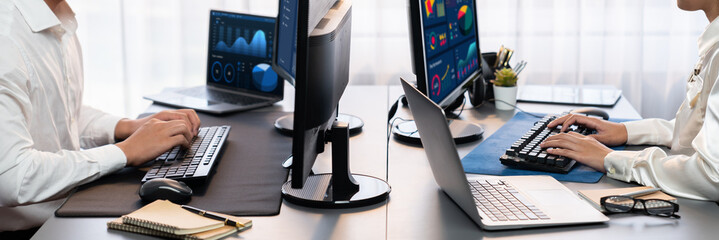 Poster - analyst working on data analysis or bi dashboard on computer monitor. business team analyzing financ