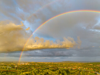 Wall Mural - Panorama with a rainbow coming out of the factory