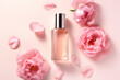 Skin care face serum bottle surrounded by pink peony flowers