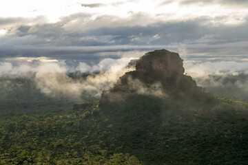 Beautiful sandstone hill covered by morning mist