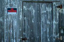 No Trespassing Sign On Old Barn 