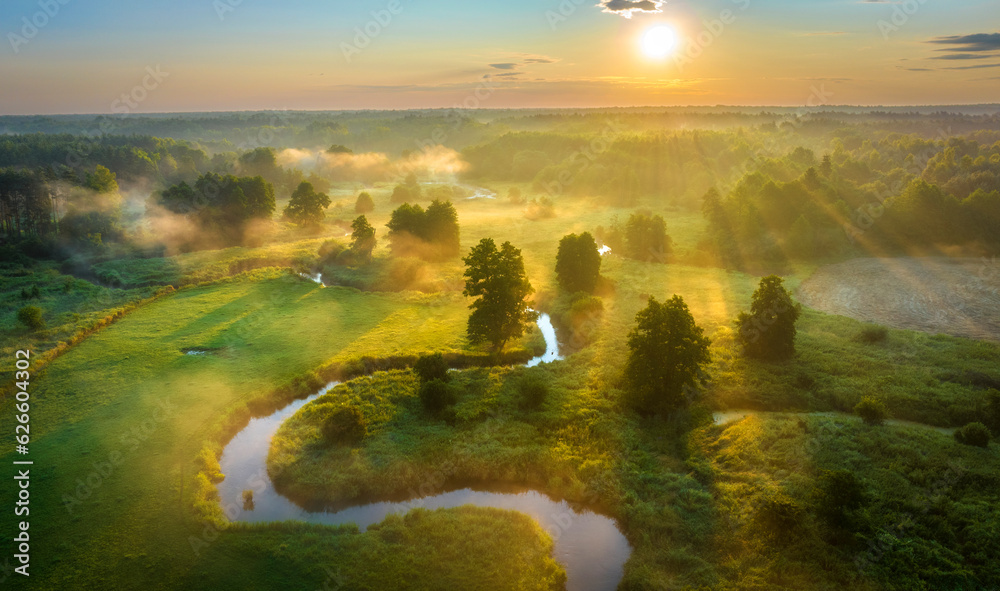 Beautiful summer sunrise over the river covered with morning fog Stock ...