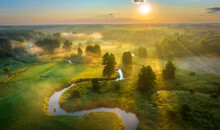 Beautiful Summer Sunrise Over The River Covered With Morning Fog