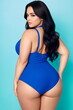 Beauty curve plus size fat woman in a blue underwear lingerie on a blue background.Long dark hair.Digital creative designer fashion art.