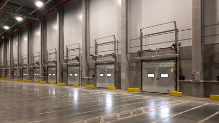 Poster - truck at loading ramps of a warehouse. Delivery logistics concept background
