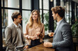 © Nedrofly - People networking and socializing at a business event during a break