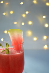 Wall Mural - Fresh watermelon juice with lots of flavor, on a bokeh background