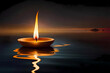 Burning Diwali diya oil lamp floating down the river