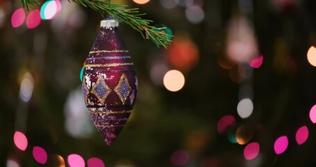 Aufkleber - Christmas tree decorated red toy, Fir branch bell and festive lights on the Christmas background with sparkle and bokeh