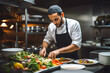 © MVProductions - A young male chef preparing food in a restaurant kitchen, displaying culinary expertise and passion for cooking