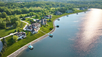 Wall Mural - Lakeside property aerial large homes with docks in water mansions