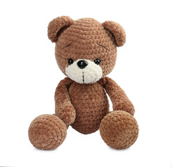 Wall Mural - Cute crocheted bear isolated on white. Children's toy