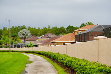 Poster - A typical Florida community, wall and road