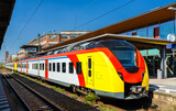 Fototapeta  - Regional train in Ruesselsheim am Main - Hessen, Germany