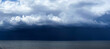 Panorama of the Baltic Gulf with dramatic dark rain clouds before thunder storm over Baltic sea in Jurmala, Latvia. Dark thunderstorm clouds rainny atmosphere. Meteorology danger windstorm disasters c