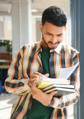 Poster - Happy indian male student at the university