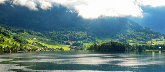 Wall Mural - Norway.  Amazing nature view with fjord and mountains. Beautiful reflection. 