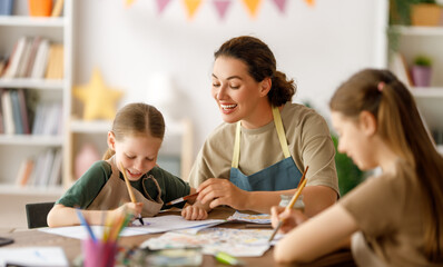 Wall Mural - kids and teacher at the art class