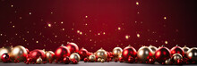 Red And Gold Christmas Ball On Wooden Table And Red Background. Copy Space. Christmas Background