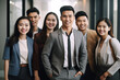 © Surachetsh - Confident Asian businesspeople in powerful poses, donning business suits, symbolizing a dynamic corporate team. Captivating unity and professionalism. generative AI.