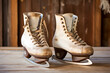A pair of vintage ice skates on a wooden background. Old white figure ice skates close up, outdoors winter activity banner. Winter sports concept. AI generated