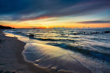 Wall Mural - Amazing sunset on the beach at Baltic Sea in Gdansk, Poland