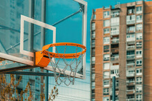 Outdoor Basketball Backboard And Hoop Rim With Chain Net In Urban Residential District
