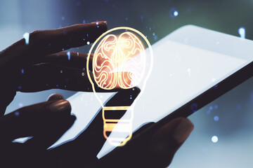 Poster - Creative light bulb with human brain hologram and hand working with a digital tablet on background, artificial Intelligence and neural networks concept. Multiexposure