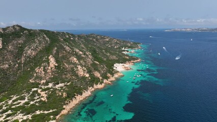 Wall Mural - view from the air on the waves and rocks. sea relaxation and travel. azure water on the sea. a brigh