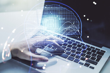 Poster - Double exposure of creative artificial Intelligence symbol with hands typing on laptop on background. Neural networks and machine learning concept