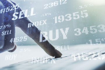 Poster - Abstract creative financial graph with hand typing on laptop on background, financial and trading concept. Multiexposure