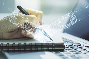Poster - Creative abstract block chain technology hologram with handshake and hand writing in diary on background with laptop, cryptography and decentralization concept. Multi exposure