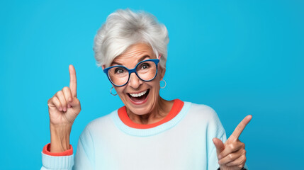 Senior woman wearing casual clothes and glasses pointing with hand and finger to the side looking at the camera.