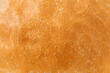 Baked bread crust, close-up surface, uniform texture background