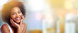 © Valerie Murray/peopleimages.com - Black woman, mockup portrait and beauty with space, smile and happiness with afro, self care and cosmetics, Young model, gen z african and happy with natural hair, skincare and blurred background