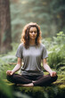 © kalafoto - A person practicing mindfulness meditation in a serene natural setting.