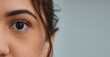 Woman, eye and zoom in portrait by space, mockup or health for vision, contact lens or biometric test. Girl, model and closeup for cybersecurity banner, retina or cornea scan for safety by background