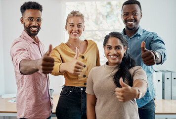 Poster - Climbing our way up the business ladder. Cropped portrait of a diverse group of businesspeople standing together and making a thumbs up gesture in the office.