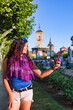 © Sangiao_Photography - Alcala de Henares. Latin mid-woman travel holiday lifestyle portrait happy with smartphone in Spain