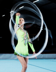 Poster - Gymnastics, sports and woman with ribbon blur in gym for rhythmic body movement, training or exercise. Aerobics performance, health and portrait of female dancer for competition, practice and dance