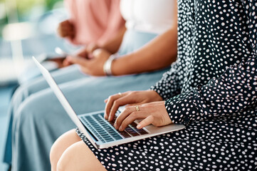 Aufkleber - Her notes will be safer digitally. Cropped shot of a group of unrecognizable businesswomen using wireless technology while sitting in line in a modern office.