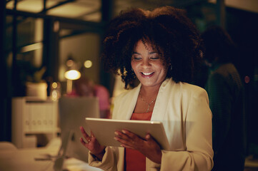 Aufkleber - This tool will help me reach deadline so much quicker. Shot of a businesswoman using a digital tablet in an office at night.