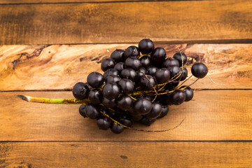 Wall Mural - Fresh organic acai berries - Euterpe oleracea