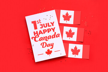 Wall Mural - Card with text 1ST JULY HAPPY CANADA DAY and flags on red background