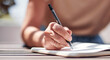 © HockleyMedia/peopleimages.com - Hand, writing and book with a woman author sitting outdoor in summer for inspiration as a writer. Idea, planning and notebook with a female person using a pen to write in her journal or diary outside