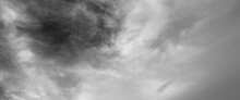 Panorama View Of Overcast Sky, Dramatic Gray Sky And White Clouds Before Rain In Rainy Season, Cloudy Gray Sky With Thick Dense Clouds,  Sky With Storm Clouds Dark, The Dark Sky With Heavy Clouds.
