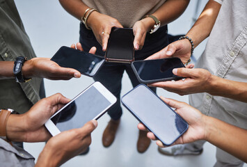 Poster - Group, mockup phone screen and circle of people with mobile app, multimedia network and contact from above. Closeup, hands and team with smartphone technology, digital download and sharing UI data
